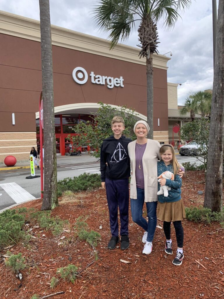 Family posing in front of Target building